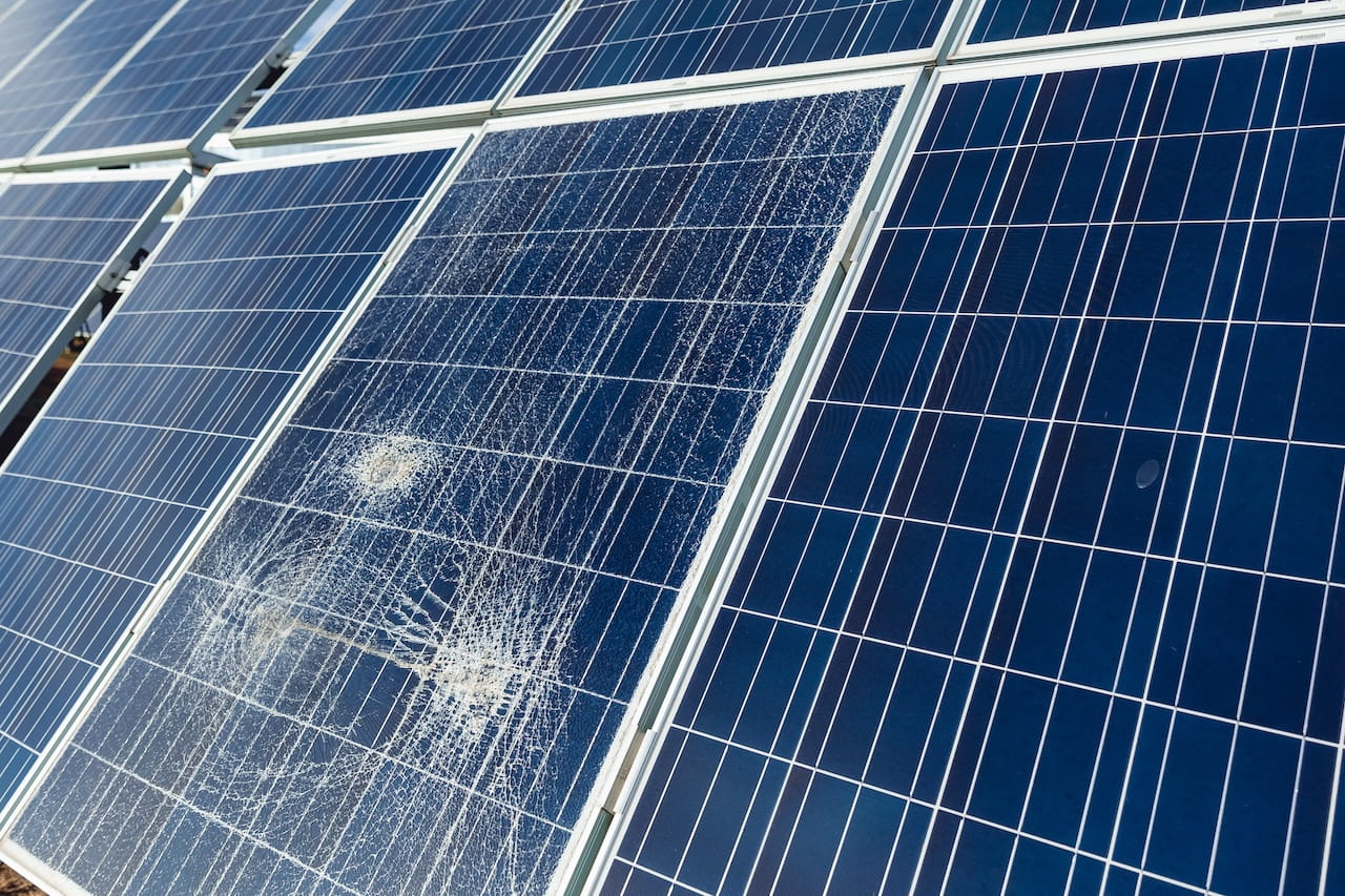 hail damaged solar panels; severe damaged caused by marble sized hail
